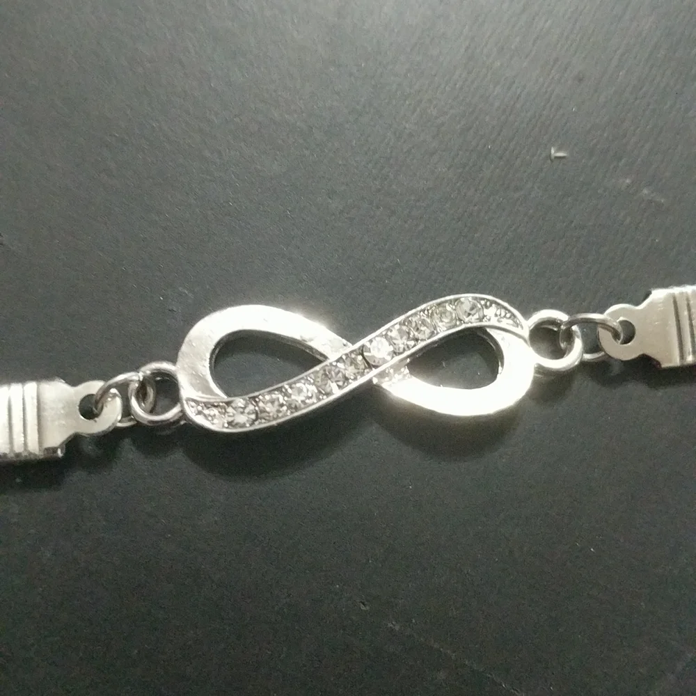 Silver Tone Clear Rhinestone Infinity Symbol Statement Bracelet